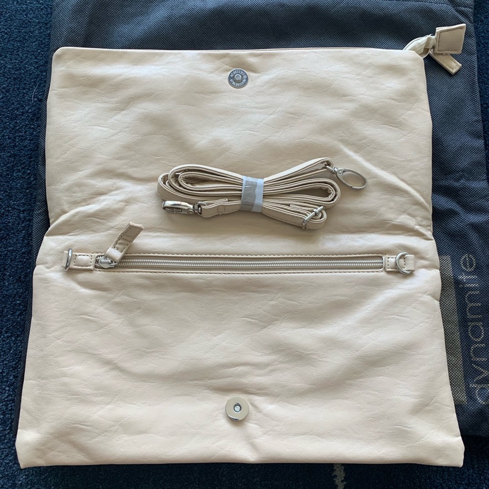 Cream colored Dynamite slouchy clutch